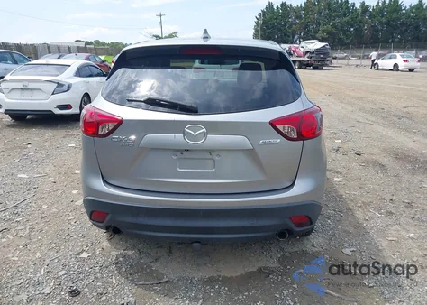 2013 Mazda Cx-5 Touring z USA, uszkodzony, nr VIN JM3KE4CE9D0133961